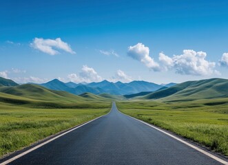 Naklejka premium Driving on Road Through Green Hills Landscape Under a Bright Blue Sky
