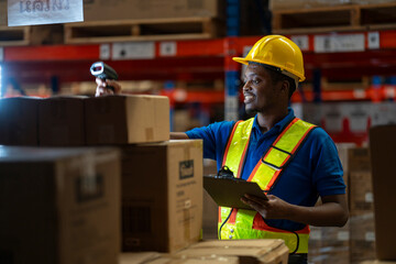 A team of engineers inspects the warehouse in a large storage warehouse. The inspection team uses...
