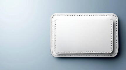 Two White Textured Rectangular Objects on Gray Background