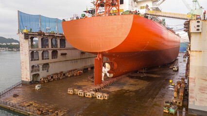 Propeller of large ship spinning power working and water splash contrail . Close up image detail Stern back of Vessel ship, Logistics Transportation industry express technology Freight.. © Yellow Boat