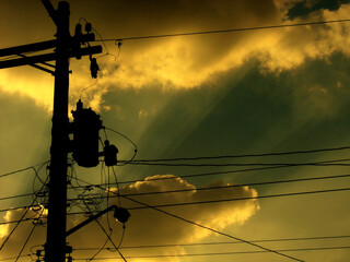 power lines at sunset with beautiful sky