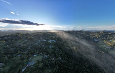 Mountains view in drone fly in near Medellin whit clouds