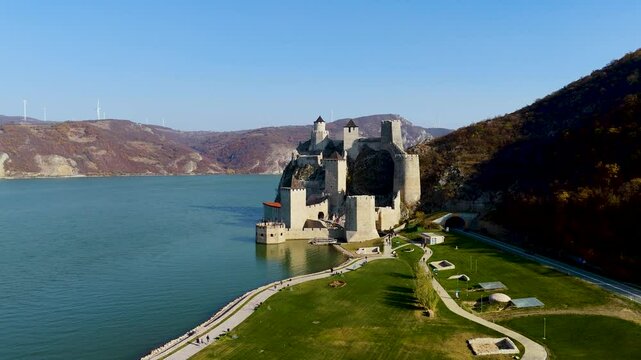 Embark on a mesmerizing aerial tour around Golubac Fortress. Witness dramatic rocky formations and the mighty Danube as the camera captures the stunning interplay of nature and history.