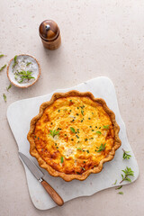Salmon quiche freshly baked on a serving board, healthy breakfast idea