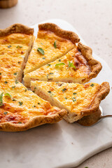 Salmon quiche freshly baked on a serving board, healthy breakfast idea