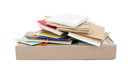 Stack of different paper envelopes and parcel on white background. Post office