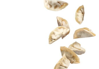 Naklejka premium Uncooked gyoza in air on white background