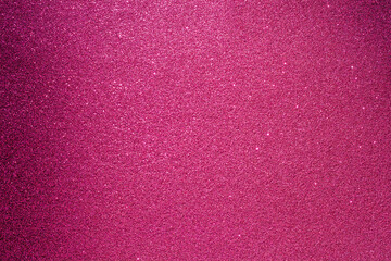 A pink background with a lot of glitter