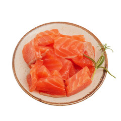 Salmon fish pieces in a plate and rosemary isolate.