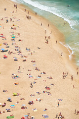 Bird's-eye view on Nazare sandy beach riviera on the coast of Atlantic ocean