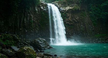 Fototapeta premium Majestic Waterfall In Lush Rainforest