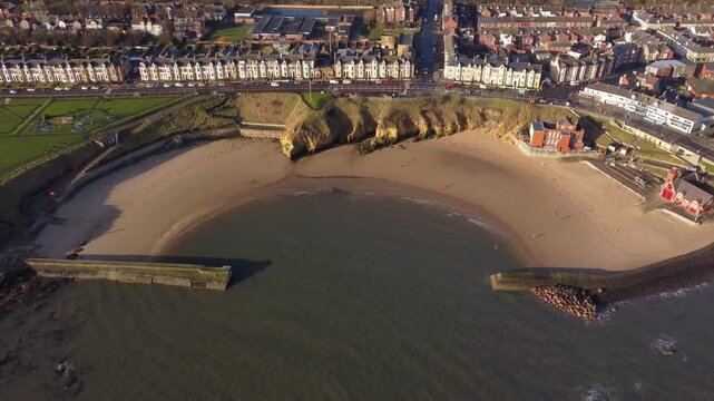 Cullercoats beach, sea and main coastal road from above - North Tyneside Coastline