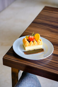 Elegant Dessert with Fruit and Chocolate Garnish