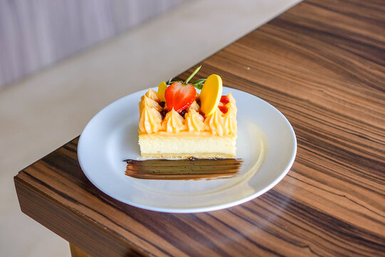 Elegant Dessert with Fruit and Chocolate Garnish
