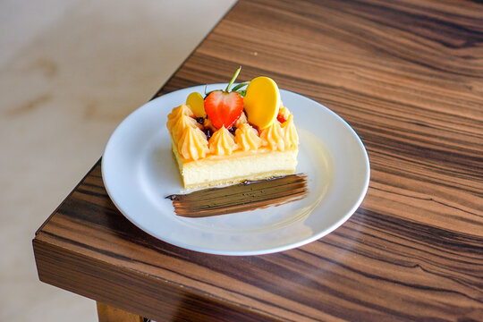 Elegant Dessert with Fruit and Chocolate Garnish