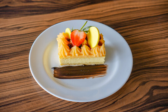 Elegant Dessert with Fruit and Chocolate Garnish