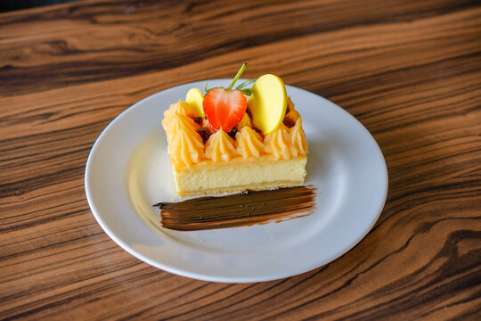 Elegant Dessert with Fruit and Chocolate Garnish