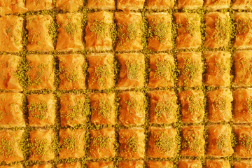 Delicious baklava displayed at a market in the afternoon sun