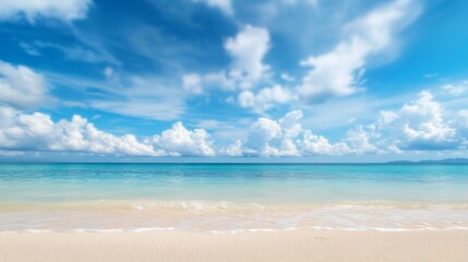 Beautiful beach with white sand and blue sky background, a summer vacation concept banner with copy space for text.