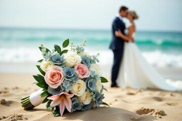 Romantic beach wedding scene with a bridal bouquet in the foreground and a bride and groom embracing near the ocean. Elegant destination wedding, love and celebration concept.