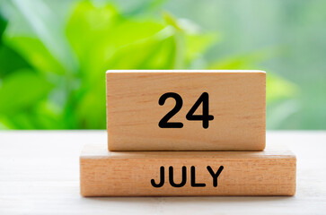 July 24th calendar text on wooden blocks with customizable space for text. Calendar concept.