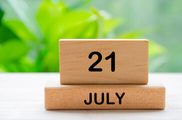 July 21th calendar text on wooden blocks with customizable space for text. Calendar concept.
