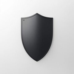 Black, shield-shaped emblem on a white background. Minimalist design, protection concept