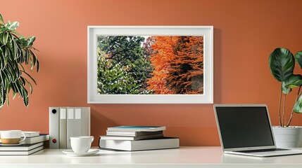 A white rectangular frame in a home office above a desk with a cup of coffee, a laptop, and a stack of books.  HD 8K mockup wallpaper Photographic Image