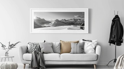 A white rectangular frame in a living room, displayed above a sofa with a cozy throw blanket, a couple of cushions,  HD 8K mockup wallpaper Photographic Image
