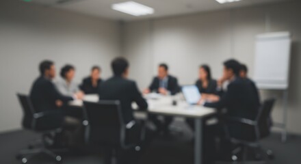 Blurred corporate discussion in a meeting room, perfect for business strategy content or professional collaboration visuals.