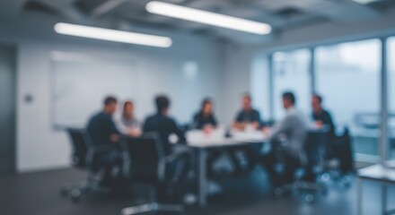 Blurred business meeting in a modern conference room, ideal for corporate content or teamwork visuals.