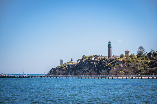 Black lighthouse in the sea, Queenscliff, Victoria, Australia, with the white lighthouse in the background.