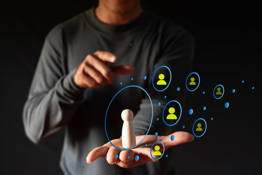 Customer Relationship Management Concept, Businessman holding global customer network technology, developing information exchange, customer service, social media, therefore display icons on 