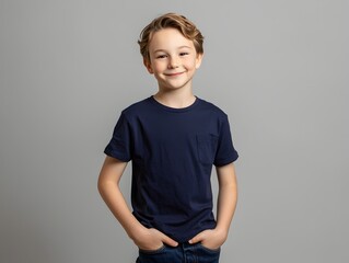 Photo of a Smiling Young Boy in a Blue T-Shirt