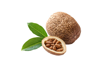 Nutmeg whole and halved with leaves on black background spice seeds aroma flavor