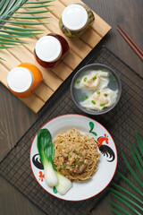 TRADITIONAL FOOD MIE OR BAKMI AYAM WITH DUMPLINGS