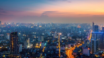 Naklejka premium Stunning Urban Cityscape at Dusk: Vibrant City Lights Overlooking a Metropolitan Skyline