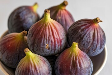 Obraz premium fresh figs with a white background