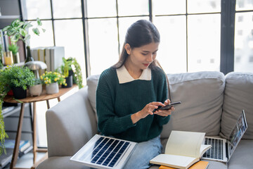 Home owner install solar power systems in her house Asian Woman learning about sustainable technology