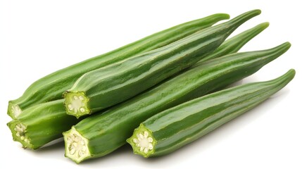 Fresh Green Okra Stacked Together on a White Background Ready for Culinary Preparation