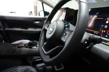 Obraz premium 自動車のハンドルのクローズアップ