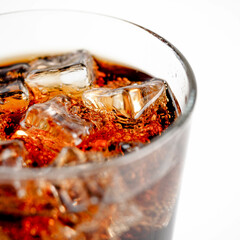 Cola with Ice Cubes on a White Background | Refreshing Cola Drink.