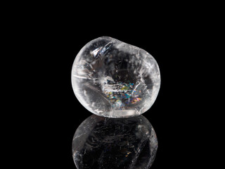 A photograph of rutile quartz, a mineral characterized by its needle-like inclusions, often described as “hairy.”