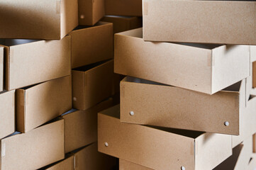 Creative cardboard box blanks stacked together in a manufacturing facility for efficient production...