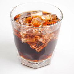 Cola with Ice Cubes on a White Background | Refreshing Cola Drink.