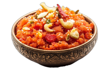Garnished carrot halwa in ornate bowl.