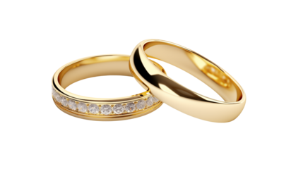 Two golden wedding rings one with diamonds on a black background