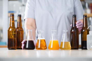 Brewery science: analyzing beer samples in laboratory setting. Concept banner control quality of...