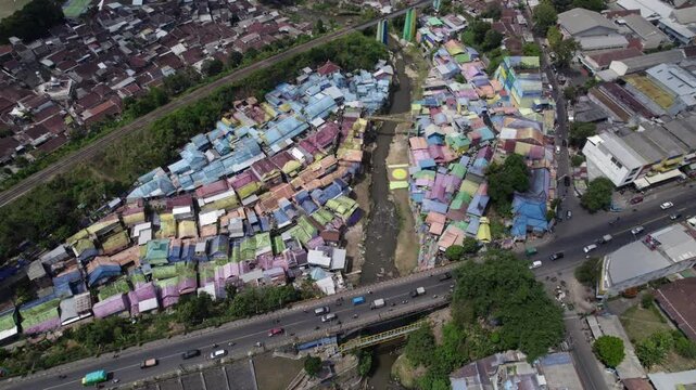 Drone view Colorful houses along jodipan river in malang city, indonesia