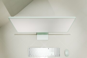 Mockup green desktop computer on light green tile floor. White blank screen for template material.